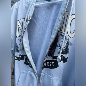 Divided Ontario light blue zip up